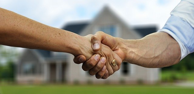 two people shaking hands